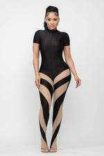 Load image into Gallery viewer, Catty Footed Jumpsuit
