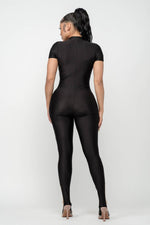 Load image into Gallery viewer, Catty Footed Jumpsuit
