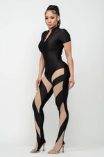 Load image into Gallery viewer, Catty Footed Jumpsuit
